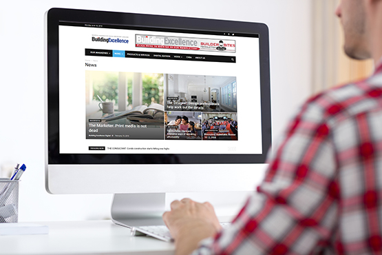 Computer showing Building Excellence Digital edition