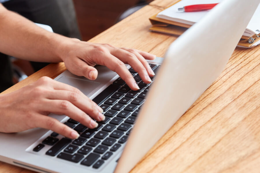 typing on a laptop
