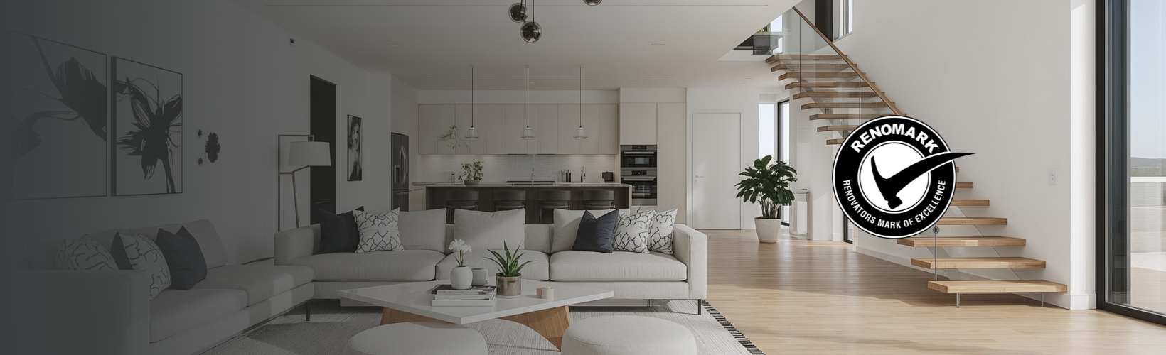 Modern living room and kitchen with neutral decor, floating wooden staircase, large windows, and a Canadian Home Builders’ Association Renomark certification logo overlay on the right side of the image.